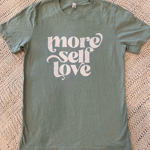 Pink Lily Love is More T-shirt size medium. New, only tried on.